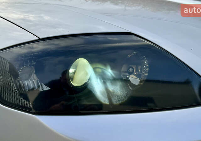 Серый Хендай Купе, объемом двигателя 2 л и пробегом 133 тыс. км за 5350 $, фото 25 на Automoto.ua