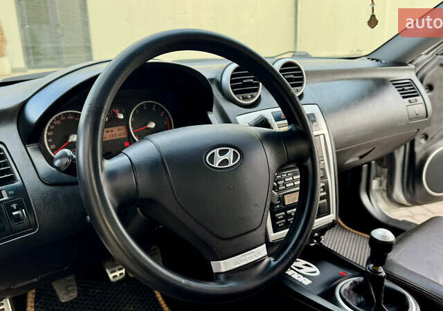 Серый Хендай Купе, объемом двигателя 2 л и пробегом 133 тыс. км за 5350 $, фото 40 на Automoto.ua