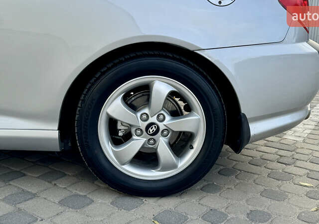 Серый Хендай Купе, объемом двигателя 2 л и пробегом 133 тыс. км за 5350 $, фото 12 на Automoto.ua