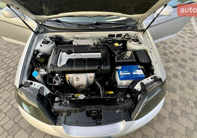 Серый Хендай Купе, объемом двигателя 2 л и пробегом 133 тыс. км за 5350 $, фото 71 на Automoto.ua