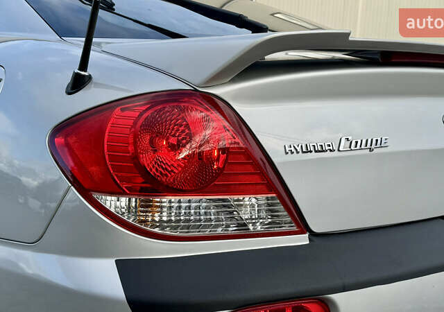Серый Хендай Купе, объемом двигателя 2 л и пробегом 133 тыс. км за 5350 $, фото 34 на Automoto.ua