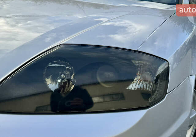 Серый Хендай Купе, объемом двигателя 2 л и пробегом 133 тыс. км за 5350 $, фото 7 на Automoto.ua