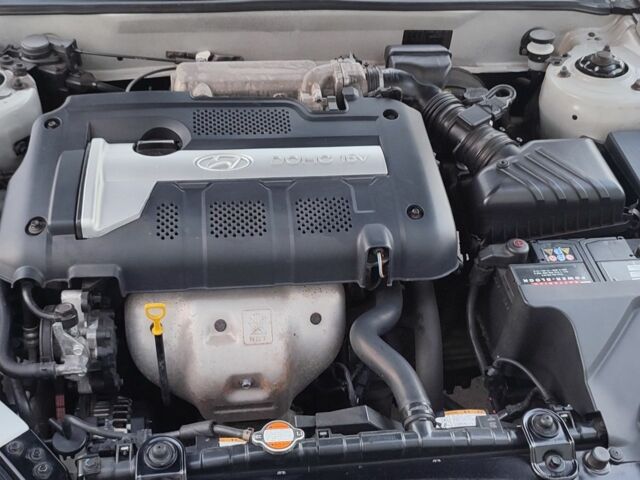 Сірий Хендай Купе, об'ємом двигуна 2 л та пробігом 167 тис. км за 7700 $, фото 7 на Automoto.ua