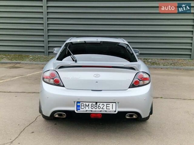 Серый Хендай Купе, объемом двигателя 1.98 л и пробегом 185 тыс. км за 7990 $, фото 11 на Automoto.ua