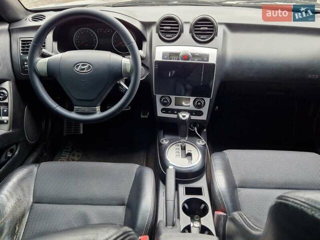 Серый Хендай Купе, объемом двигателя 1.98 л и пробегом 185 тыс. км за 7990 $, фото 18 на Automoto.ua