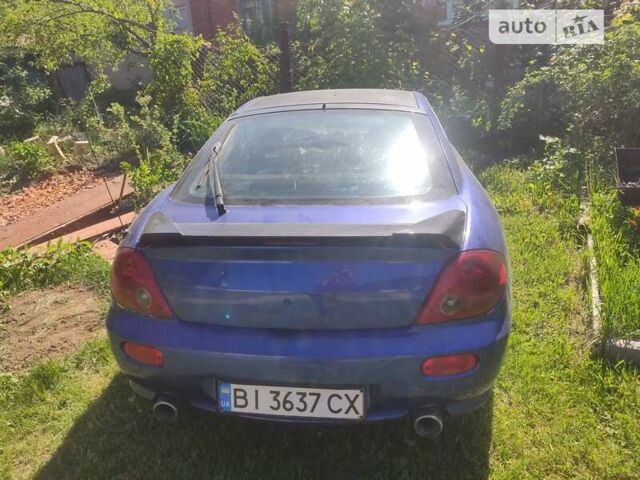 Синий Хендай Купе, объемом двигателя 2 л и пробегом 235 тыс. км за 3400 $, фото 1 на Automoto.ua