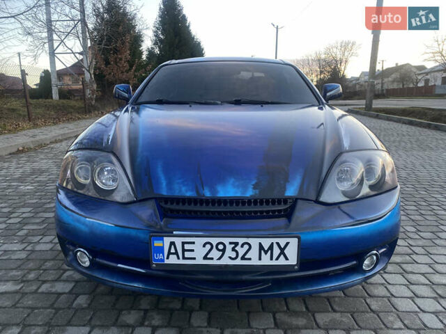 Синий Хендай Купе, объемом двигателя 2 л и пробегом 232 тыс. км за 4800 $, фото 17 на Automoto.ua