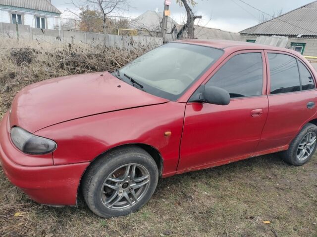 Красный Хендай Другая, объемом двигателя 1.3 л и пробегом 470 тыс. км за 600 $, фото 1 на Automoto.ua