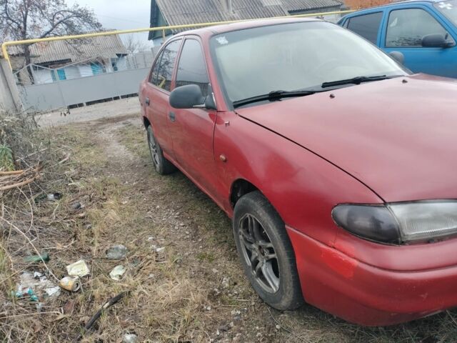 Красный Хендай Другая, объемом двигателя 1.3 л и пробегом 470 тыс. км за 600 $, фото 3 на Automoto.ua