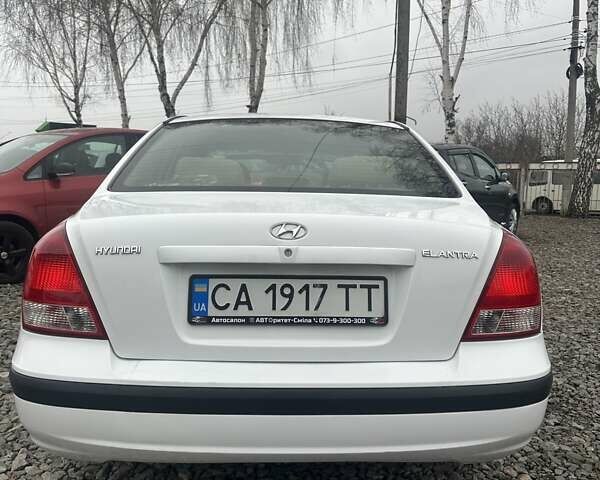 Білий Хендай Елантра, об'ємом двигуна 2 л та пробігом 193 тис. км за 4200 $, фото 22 на Automoto.ua