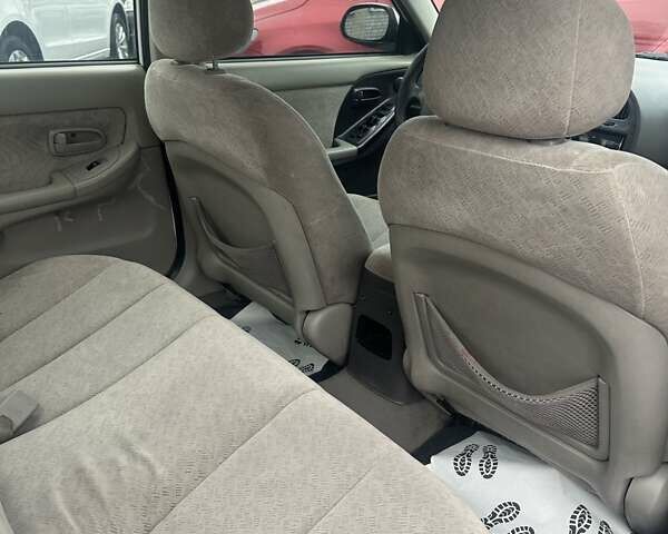 Білий Хендай Елантра, об'ємом двигуна 2 л та пробігом 193 тис. км за 4200 $, фото 16 на Automoto.ua