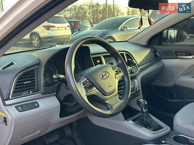 Белый Хендай Элантра, объемом двигателя 2 л и пробегом 180 тыс. км за 8900 $, фото 21 на Automoto.ua