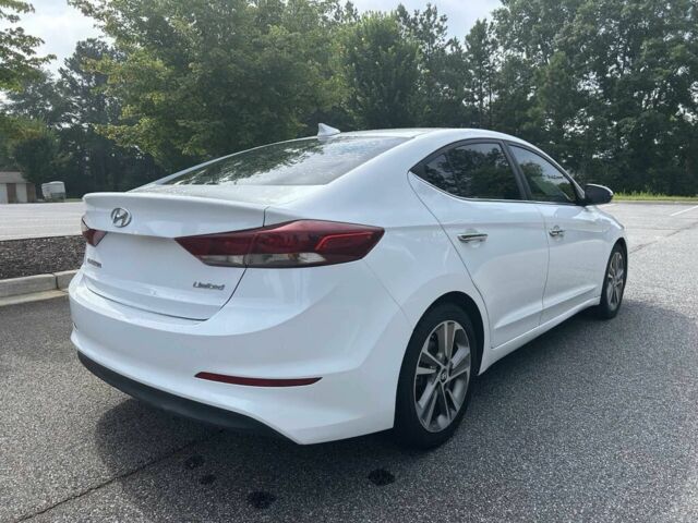 Белый Хендай Элантра, объемом двигателя 2 л и пробегом 70 тыс. км за 2600 $, фото 6 на Automoto.ua