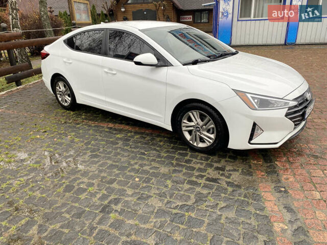 Белый Хендай Элантра, объемом двигателя 2 л и пробегом 82 тыс. км за 14200 $, фото 2 на Automoto.ua