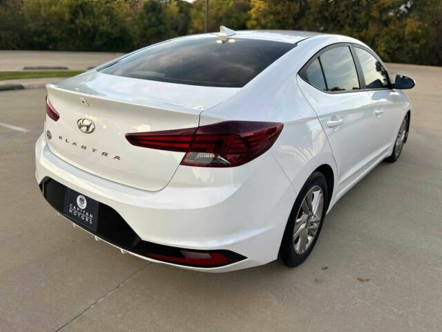 Белый Хендай Элантра, объемом двигателя 2 л и пробегом 38 тыс. км за 1700 $, фото 5 на Automoto.ua