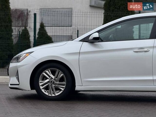 Білий Хендай Елантра, об'ємом двигуна 2 л та пробігом 84 тис. км за 13600 $, фото 8 на Automoto.ua