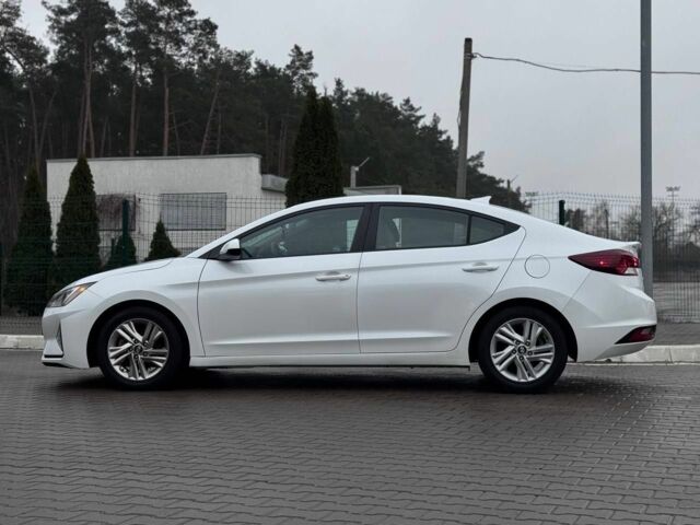 Білий Хендай Елантра, об'ємом двигуна 2 л та пробігом 84 тис. км за 13600 $, фото 6 на Automoto.ua