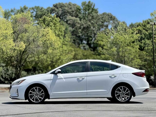 Белый Хендай Элантра, объемом двигателя 2 л и пробегом 34 тыс. км за 9400 $, фото 3 на Automoto.ua