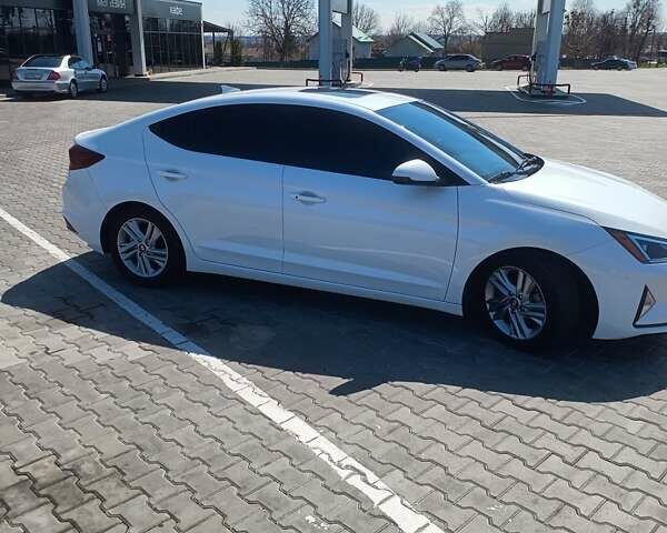 Белый Хендай Элантра, объемом двигателя 2 л и пробегом 77 тыс. км за 15600 $, фото 12 на Automoto.ua