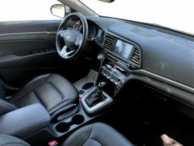 Белый Хендай Элантра, объемом двигателя 2 л и пробегом 45 тыс. км за 9500 $, фото 18 на Automoto.ua