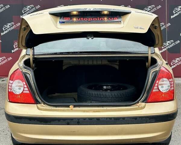 Бежевый Хендай Элантра, объемом двигателя 1.6 л и пробегом 83 тыс. км за 5400 $, фото 9 на Automoto.ua