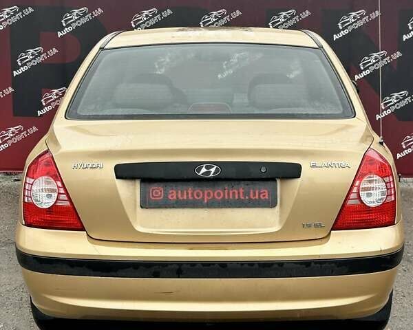 Бежевый Хендай Элантра, объемом двигателя 1.6 л и пробегом 83 тыс. км за 5400 $, фото 8 на Automoto.ua