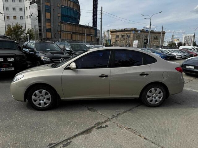 Бежевий Хендай Елантра, об'ємом двигуна 1.6 л та пробігом 167 тис. км за 6490 $, фото 1 на Automoto.ua