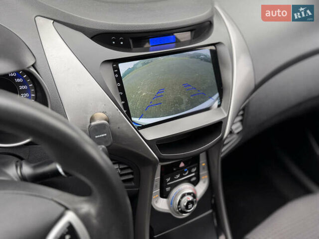 Бежевий Хендай Елантра, об'ємом двигуна 1.6 л та пробігом 185 тис. км за 9850 $, фото 26 на Automoto.ua