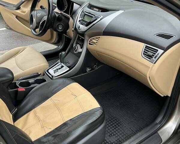 Бежевий Хендай Елантра, об'ємом двигуна 1.8 л та пробігом 158 тис. км за 9200 $, фото 14 на Automoto.ua