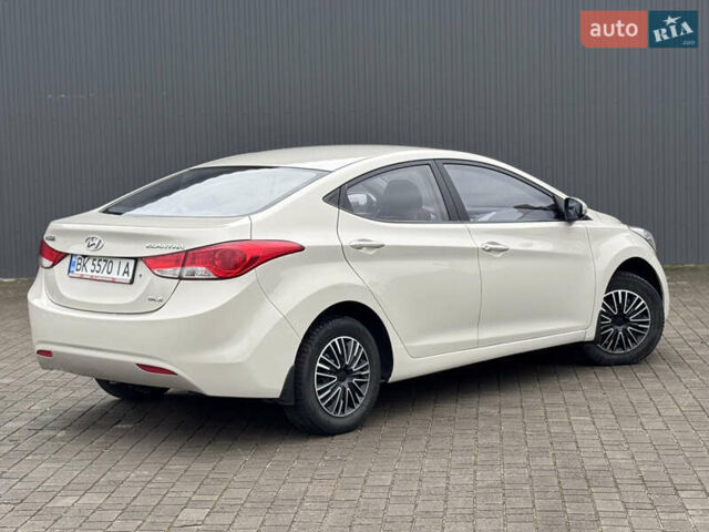 Бежевий Хендай Елантра, об'ємом двигуна 1.6 л та пробігом 185 тис. км за 9850 $, фото 14 на Automoto.ua