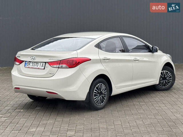 Бежевий Хендай Елантра, об'ємом двигуна 1.6 л та пробігом 185 тис. км за 9850 $, фото 13 на Automoto.ua
