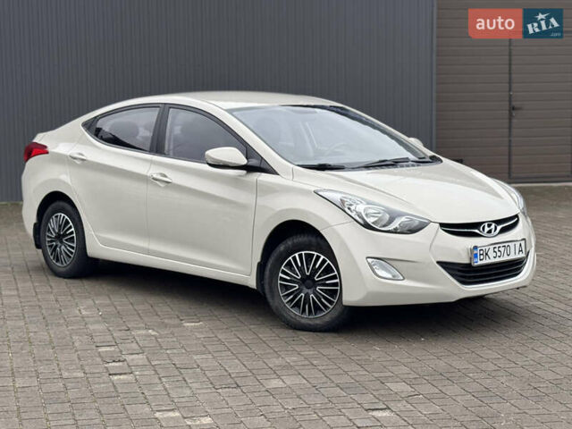 Бежевий Хендай Елантра, об'ємом двигуна 1.6 л та пробігом 185 тис. км за 9850 $, фото 5 на Automoto.ua