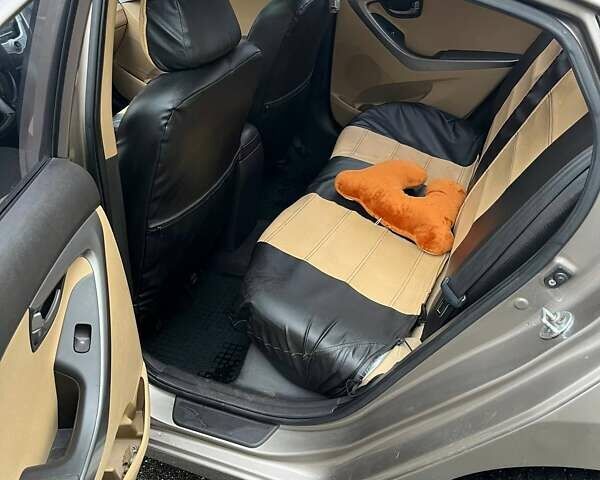 Бежевий Хендай Елантра, об'ємом двигуна 1.8 л та пробігом 158 тис. км за 9200 $, фото 11 на Automoto.ua