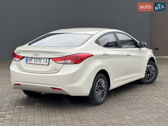 Бежевий Хендай Елантра, об'ємом двигуна 1.6 л та пробігом 185 тис. км за 9850 $, фото 12 на Automoto.ua