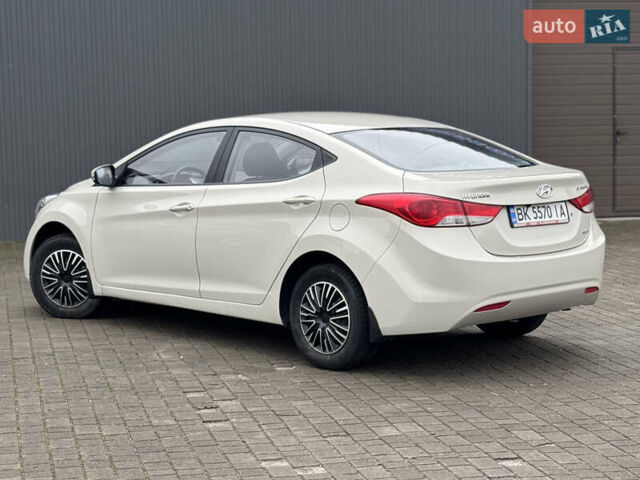 Бежевий Хендай Елантра, об'ємом двигуна 1.6 л та пробігом 185 тис. км за 9850 $, фото 9 на Automoto.ua