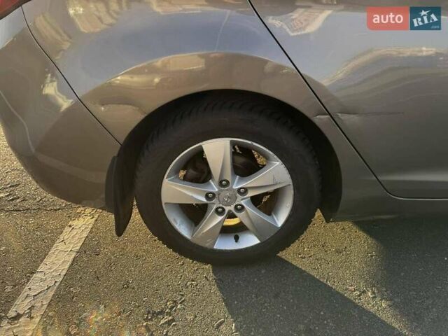 Бежевий Хендай Елантра, об'ємом двигуна 1.8 л та пробігом 163 тис. км за 9500 $, фото 27 на Automoto.ua