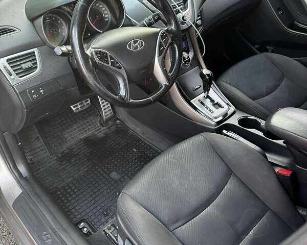 Бежевий Хендай Елантра, об'ємом двигуна 1.8 л та пробігом 163 тис. км за 9500 $, фото 9 на Automoto.ua