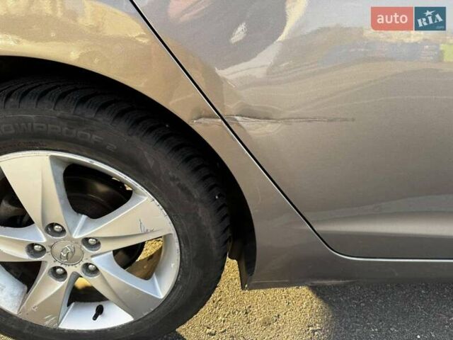 Бежевий Хендай Елантра, об'ємом двигуна 1.8 л та пробігом 163 тис. км за 9500 $, фото 25 на Automoto.ua