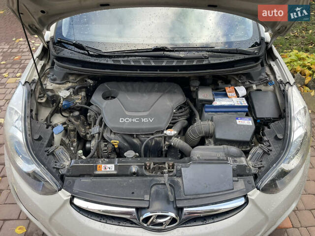 Хендай Элантра 2013 в Голованевске на Automoto.ua Бежевый Хендай Элантра, объемом двигателя 1.6 л и пробегом 130 тыс. км за 9900 $, фото 24 на Automoto.ua