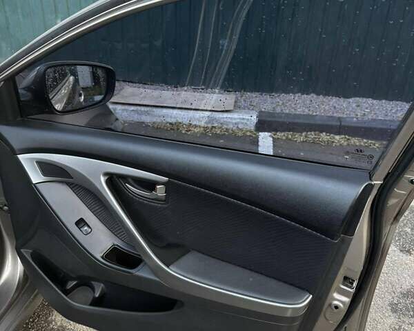 Бежевий Хендай Елантра, об'ємом двигуна 1.8 л та пробігом 163 тис. км за 9500 $, фото 18 на Automoto.ua