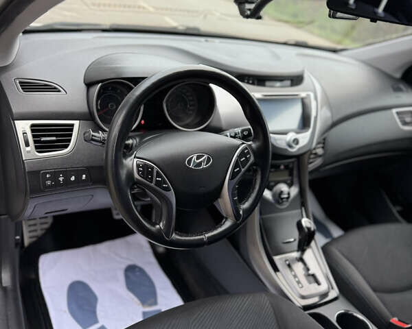Бежевий Хендай Елантра, об'ємом двигуна 1.8 л та пробігом 154 тис. км за 9750 $, фото 14 на Automoto.ua