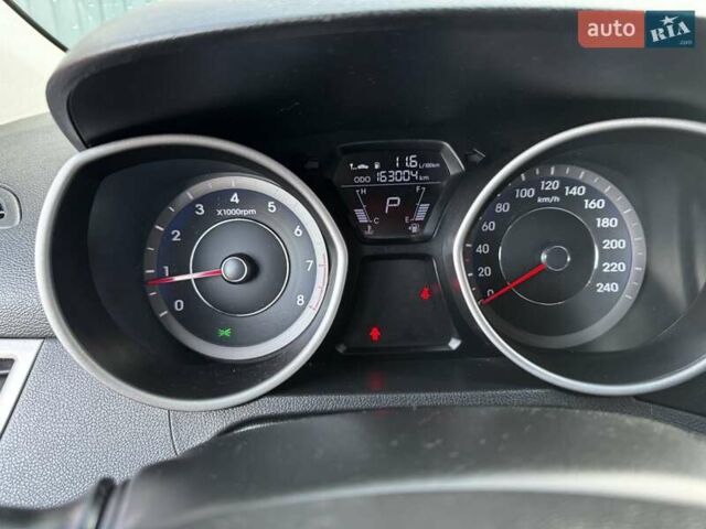 Бежевий Хендай Елантра, об'ємом двигуна 1.8 л та пробігом 163 тис. км за 9500 $, фото 13 на Automoto.ua