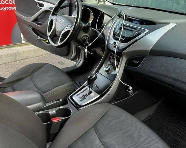 Бежевий Хендай Елантра, об'ємом двигуна 1.8 л та пробігом 163 тис. км за 9500 $, фото 11 на Automoto.ua