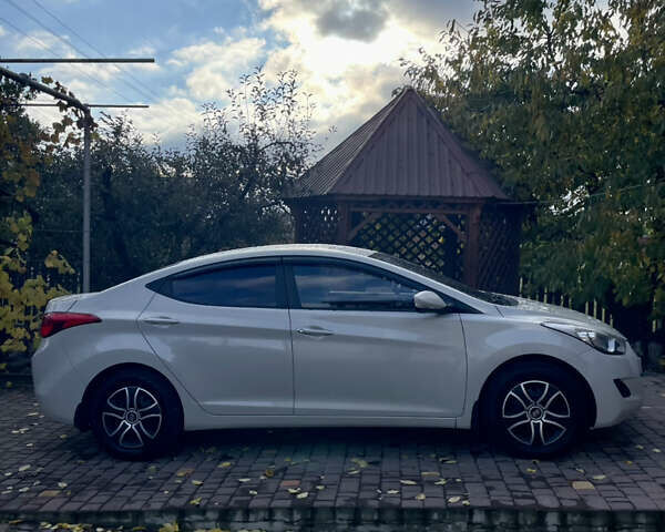 Хендай Элантра 2013 в Голованевске на Automoto.ua Бежевый Хендай Элантра, объемом двигателя 1.6 л и пробегом 130 тыс. км за 9900 $, фото 6 на Automoto.ua