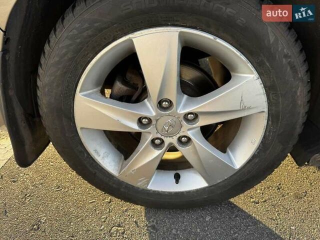 Бежевий Хендай Елантра, об'ємом двигуна 1.8 л та пробігом 163 тис. км за 9500 $, фото 28 на Automoto.ua