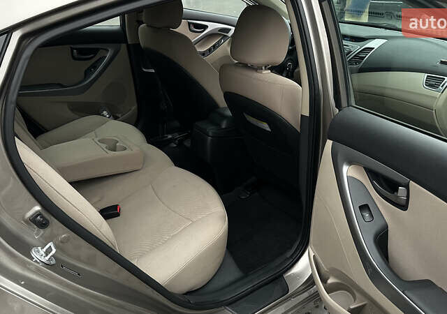 Бежевый Хендай Элантра, объемом двигателя 1.8 л и пробегом 115 тыс. км за 9600 $, фото 14 на Automoto.ua