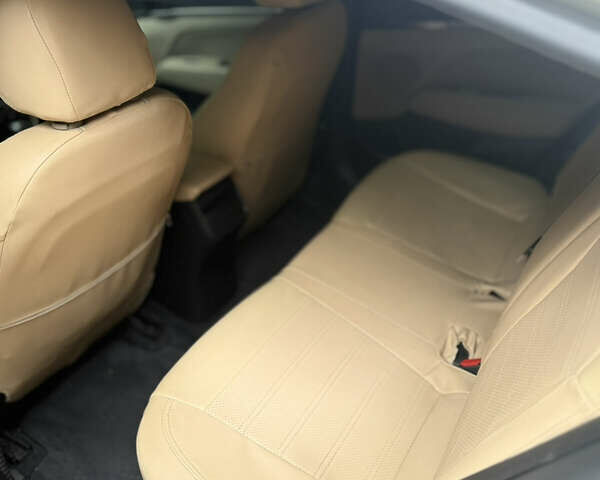 Бежевый Хендай Элантра, объемом двигателя 2 л и пробегом 127 тыс. км за 11800 $, фото 11 на Automoto.ua