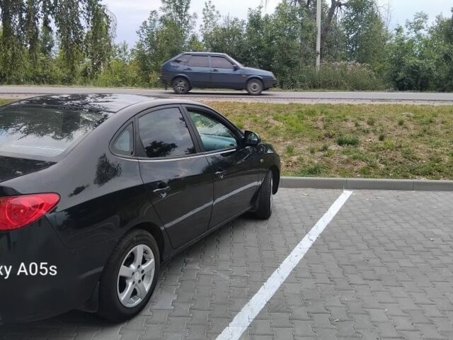 Черный Хендай Элантра, объемом двигателя 2 л и пробегом 180 тыс. км за 4000 $, фото 2 на Automoto.ua