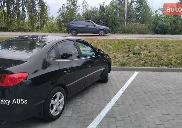 Черный Хендай Элантра, объемом двигателя 1.6 л и пробегом 170 тыс. км за 4500 $, фото 4 на Automoto.ua