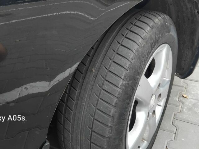 Черный Хендай Элантра, объемом двигателя 2 л и пробегом 180 тыс. км за 4000 $, фото 5 на Automoto.ua